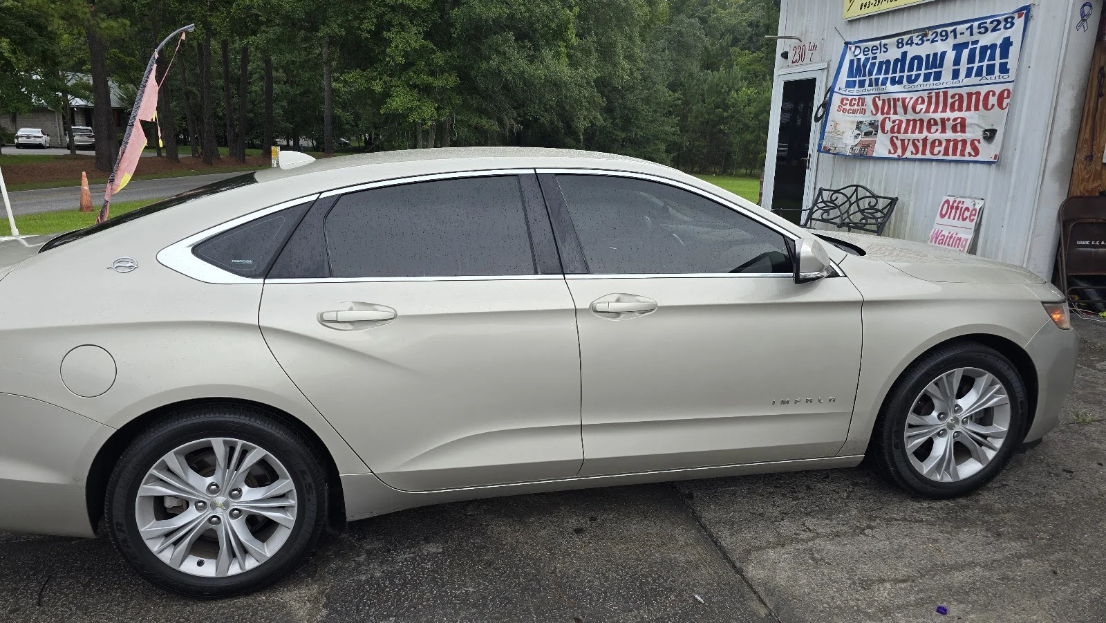 Inside Auto Window Tinting — shop interior and work bay
