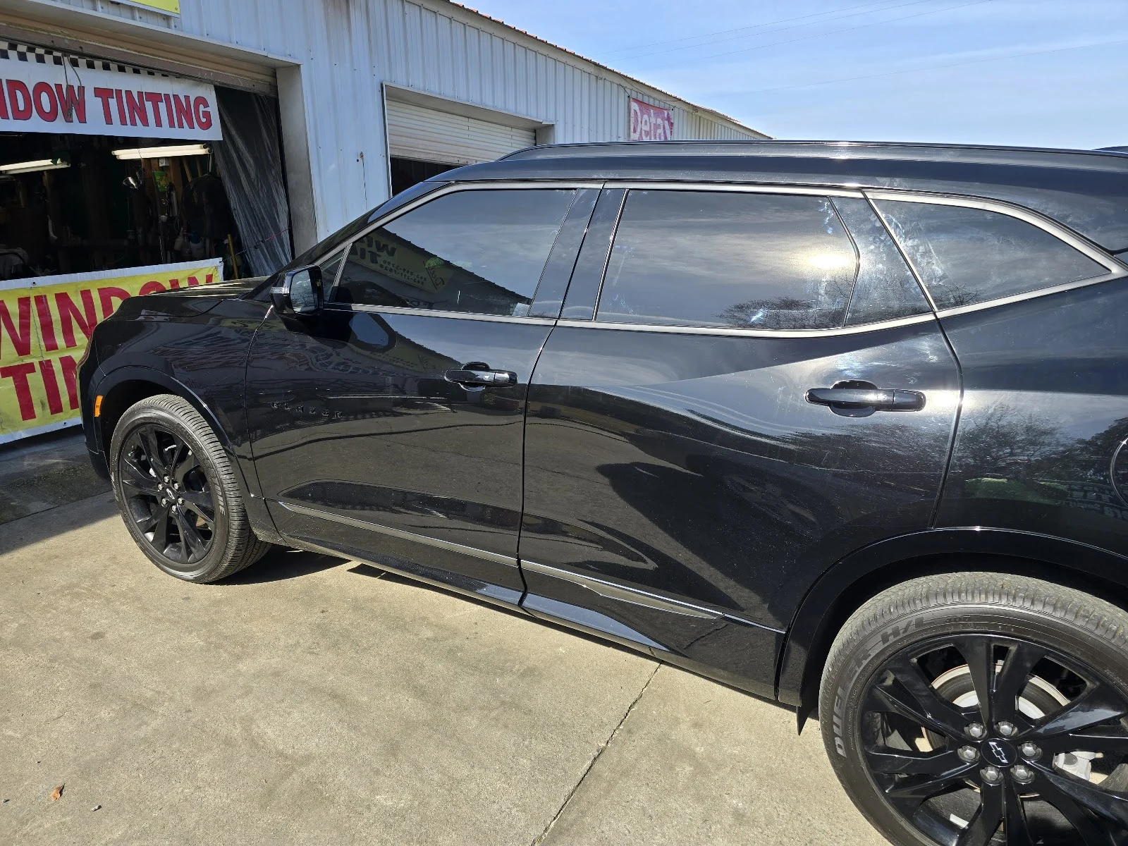 Tint install work at at Auto Window Tinting